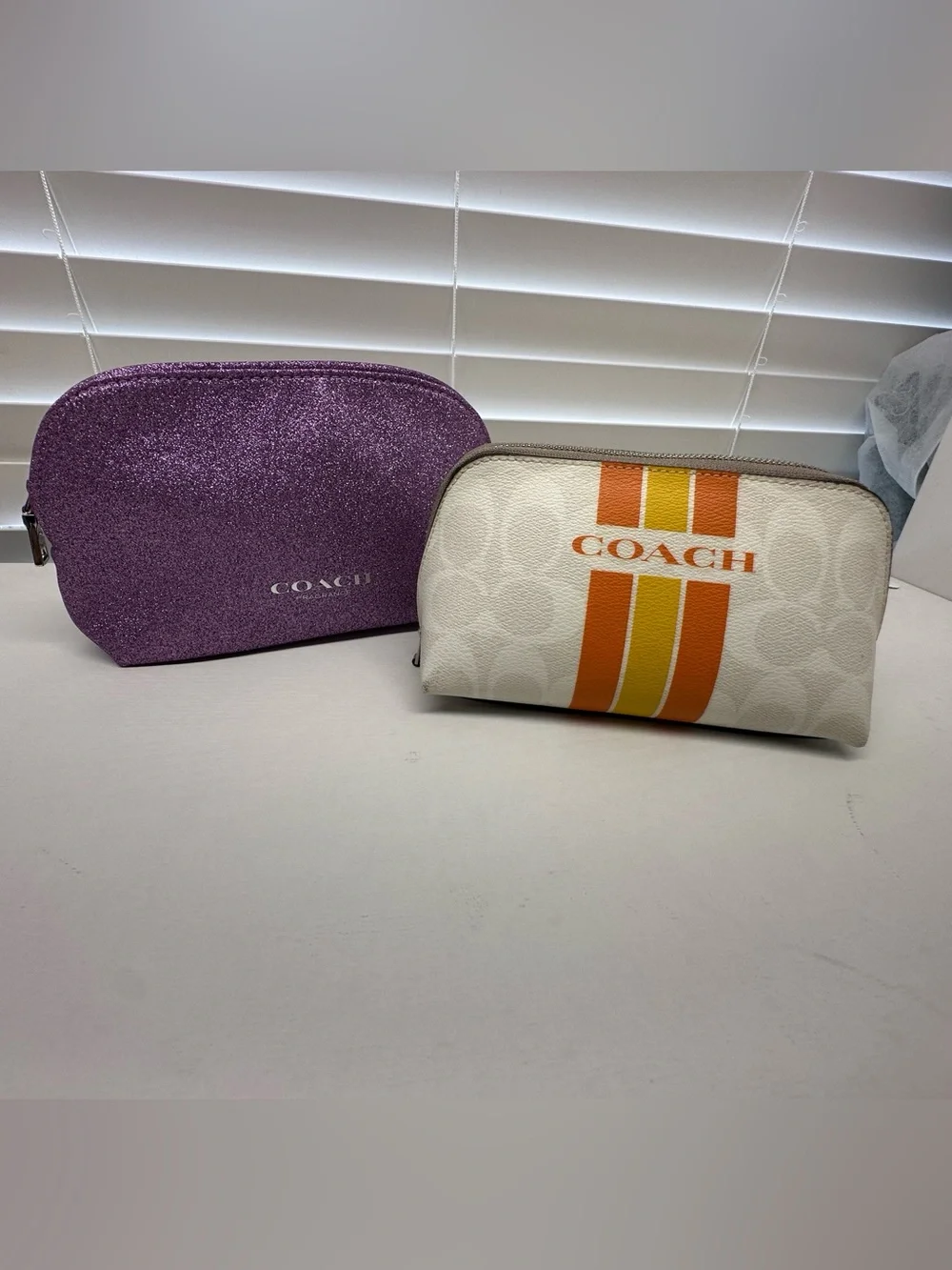 Coach Cosmetic Pouch in Cream with Orange Stripes with purple Glitter pouch